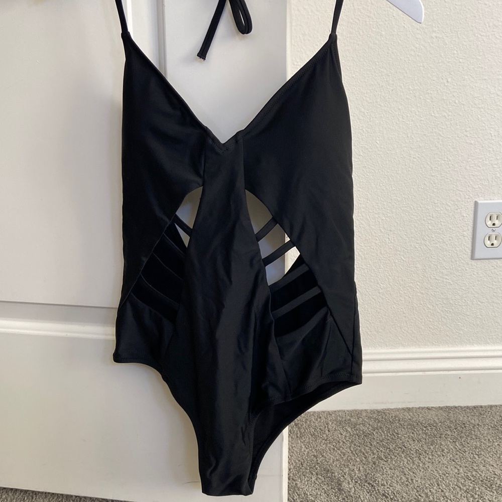 Express Swim black one piece bathing suit size medium with cutout details